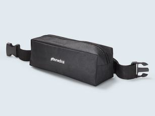 A black fabric pouch with a zippered closure, designed for medical use, features an adjustable strap on one side for secure attachment. The pouch is plain without any additional markings, highlighting its practical and functional design.