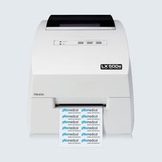 The image features a white color label printer, model LX500e, by Primera. It displays labels being printed, showcasing the text "pfm medical" along with the phrase "Quality and Experience." The printer has buttons and indicator lights on its top panel.