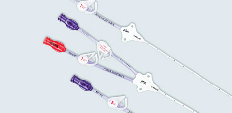 The image features a set of medical devices, specifically catheter tips, arranged from top to bottom. Each catheter is identified by different colors and a labeled size, conveying options for medical use. The background is a plain light color, emphasizing the devices.